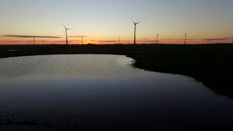 Aerial view of wind turbines at sunset, Uruguay. Stock Footage 284818927