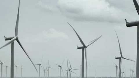 Aerial view of wind turbines under dark storm clouds. Stock Footage 340134992
