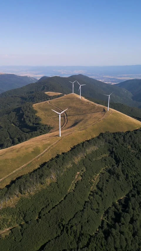 Aerial View of Wind Turbines Windmill Farm on Mountain Ridge at Sunset Stock-Footage 343510643
