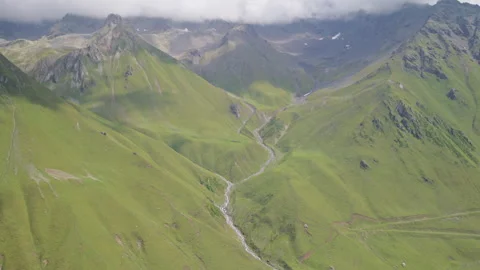 Aerial View of Winding Glacial River in Mengkete Ancient Trail Stock Footage 346113933