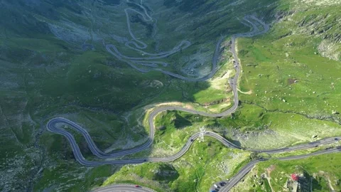 Aerial View of Winding Mountain Road and Green Valley Video stock 318648053