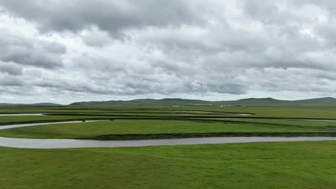 Aerial view of winding river across Chen Barag grassland Stock Footage 340217320