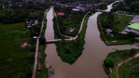 Aerial view of winding river bend and canal Stockbeeldmateriaal 347846401