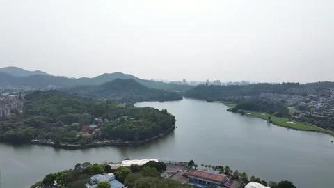 Aerial view of a winding river through a lush green landscape, guangzhou, china Stock Footage 324839185