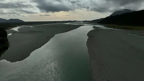 Aerial View of Winding River Through Coastal Tidal Flats Stock Footage 341606267