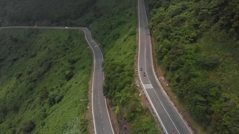 Aerial view of winding road through mountains, Vietnam. Stock Footage 284828617