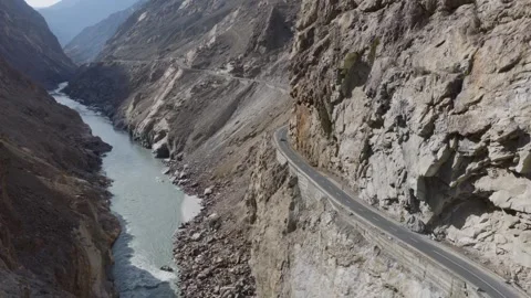 Aerial view of a winding road through a mountainous canyon in Pakistan Stock-Footage 314455722
