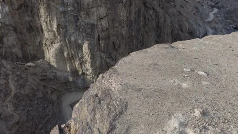 Aerial view of a winding road through rugged mountains in Pakistan, highlighting 스톡 동영상 314455810