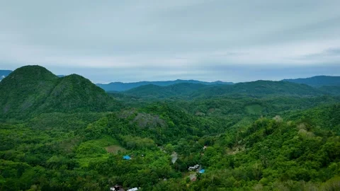 Aerial View of Winding Road Through Tropical Forest Below  Twin Peaks Stock-Footage 336482660