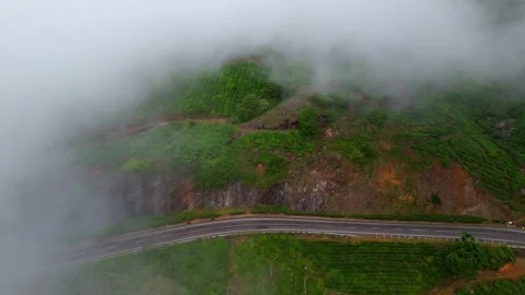 Aerial View of Winding Roads in Munnar Covered by Low Clouds Stock Footage 341311397