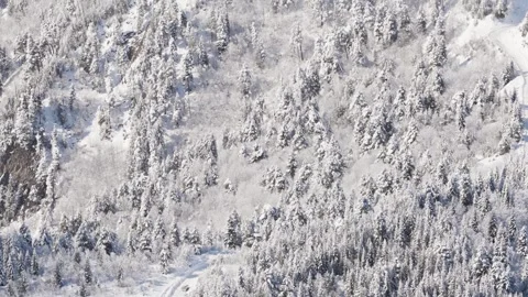 Aerial view of winding winter road to Tetnuldi in Svaneti, 4x4 yellow vehic.. Vídeo Stock 329693545