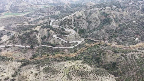 Aerial View of Winding Zigzag Mountain Road - 4K Stock Footage 331822763