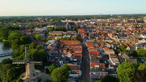 Aerial View on Windmill in Downtown Area of Alkmaar Netherlands Video stock 280298652