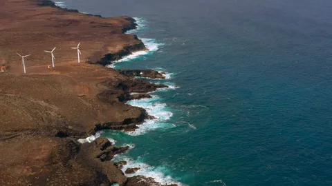 Aerial view of windmill farm at the Atlantic ocean shore on Tenerife Stock Footage 102482259