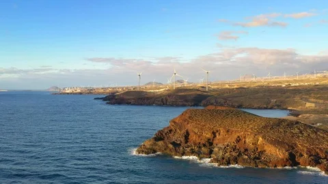 Aerial view of windmill farm at the Atlantic ocean shore on Tenerife Stock Footage 102767720
