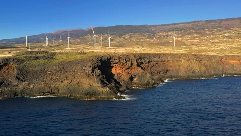 Aerial view of windmill farm at the Atlantic ocean shore on Tenerife Stock Footage 102767947