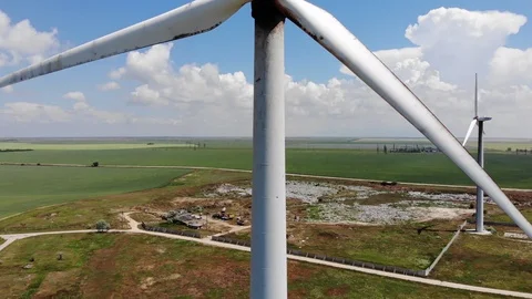 Aerial View Of Windmill Power Stations Turbines On Field Stock Footage 111078304