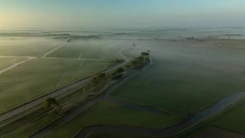 Aerial view of windmills and fields, Netherlands. Stock Footage 331942323