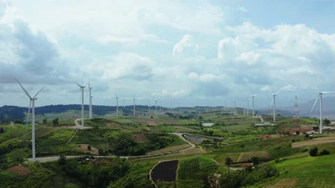 Aerial view of windmills on beautiful cloudy sky at highland. Stock Footage 203465201