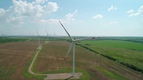 Aerial view of windmills farm in the fields. World energy power crisis. Green Stock Footage 201296640