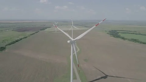 Aerial view of windmills farm in the fields. World energy power crisis. Green Stock Footage 201298323