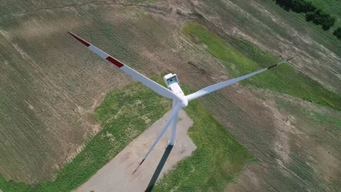 Aerial view of windmills farm in the fields. World energy power crisis. Green Stock-Footage 223530890