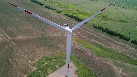 Aerial view of windmills farm in the fields. World energy power crisis. Green Stock-Footage 223531107