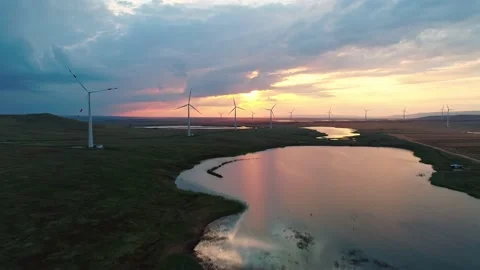 Aerial view of windmills farm in the fields. World energy power crisis. Green Vídeo Stock 236740730