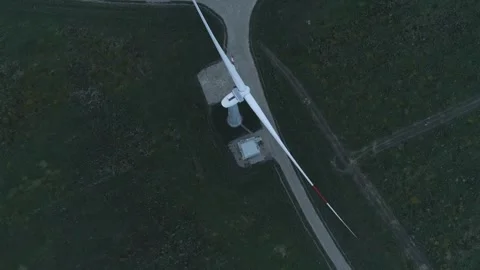 Aerial view of windmills farm in the fields. World energy power crisis. Green Stock Footage 244525720