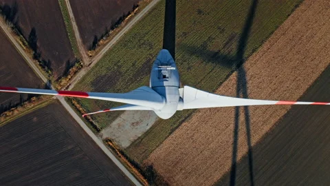 Aerial view of windmills in fields Video stock 140633752