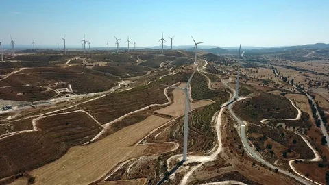 Aerial view of windmills in the mountains, wind turbine close-up Video stock 89947748