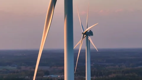 Aerial view of windmills producing renewable green energy in Finland Stock Footage 242077418