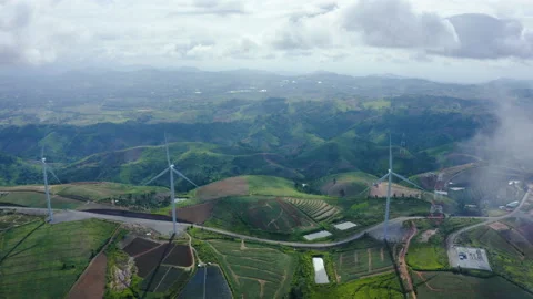 Aerial view of windmills rotating by the force of the wind Stock Footage 199346098