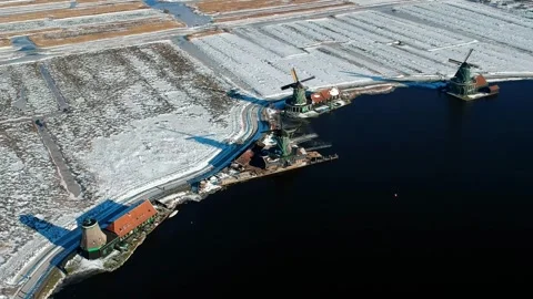 Aerial View of Windmills on Snowy Fields. Drone Footage Stock Footage 282800406
