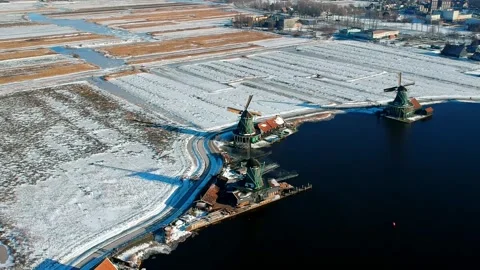 Aerial View of Windmills on Snowy Fields. Drone Footage Stock Footage 282800517
