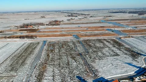 Aerial View of Windmills on Snowy Fields. Drone Footage Stock Footage 282800534