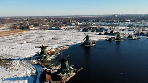 Aerial View of Windmills on Snowy Fields. Drone Footage Stock Footage 282800544