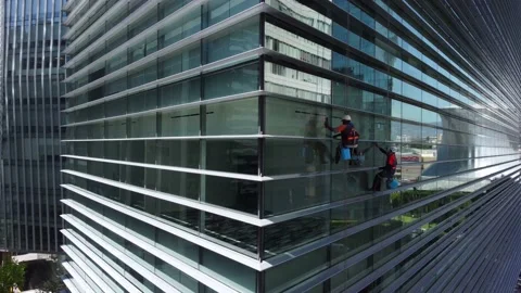Aerial view of a window cleaning work in Mexico City, Mexico 4K Stock Footage 162792418