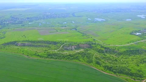 Aerial view from the window of the plane to the green fields and groves. Ukraine Stock Footage 96209792