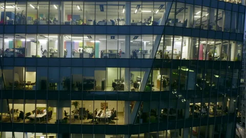 Aerial view of the windows of the skyscraper and office space at night. Stock Footage 173094716