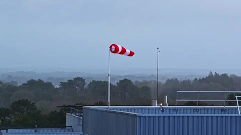 Aerial view of a windsock on a rooftop in Europe. Stock Footage 341484909