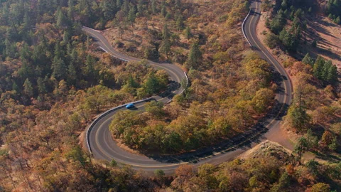 Aerial view of windy road in Fall Stock Footage 235470066