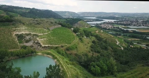 Aerial view of a wine producing valley with a river down the hill Stock Footage 137323593
