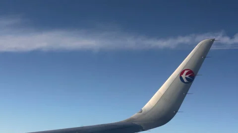 Aerial View with the Wing of China Eastern Airline's Plane. HD Stock Footage 49482274