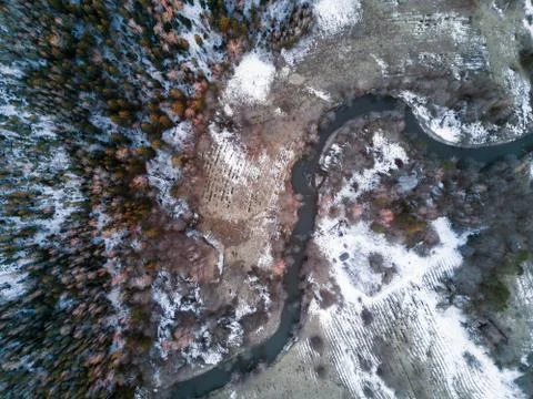 Aerial view of winter forest covered in snow and frost. Stock Photos