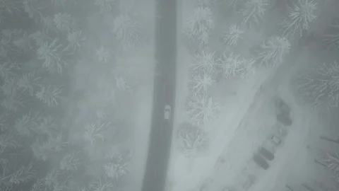 Aerial View Winter Forest  Germany car on the road Stock Footage 102472937