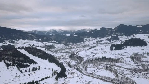Aerial view of winter forest mountains Stock Footage 125456201