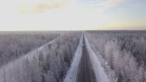 Aerial view of winter forest road, aerial top view. Winter driving Stock Footage 130309943