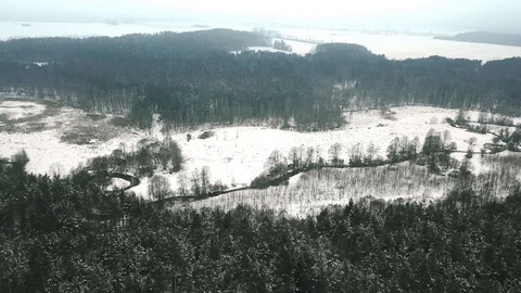 Aerial view of winter landscape. Winter nature with forest and river top view Stock Footage 87174444