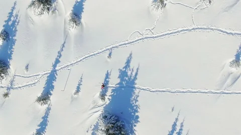 Aerial view of winter mountain and skiing snow hikers with ski and snowshoes Stock Footage 101810168